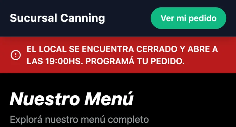 Cartel de local cerrado con la hora de reapertura